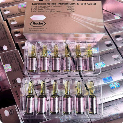 Laroscorbine Platinum E-UR Gold vitamin C ampoule set featuring multiple injectable ampoules in premium packaging, formulated with vitamin C and complementary ingredients to support skin radiance and antioxidant protection.
