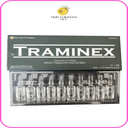 A box of Traminex, containing 10 vials of Tranexamic Acid for skin whitening. The packaging is black with the product name prominently displayed.